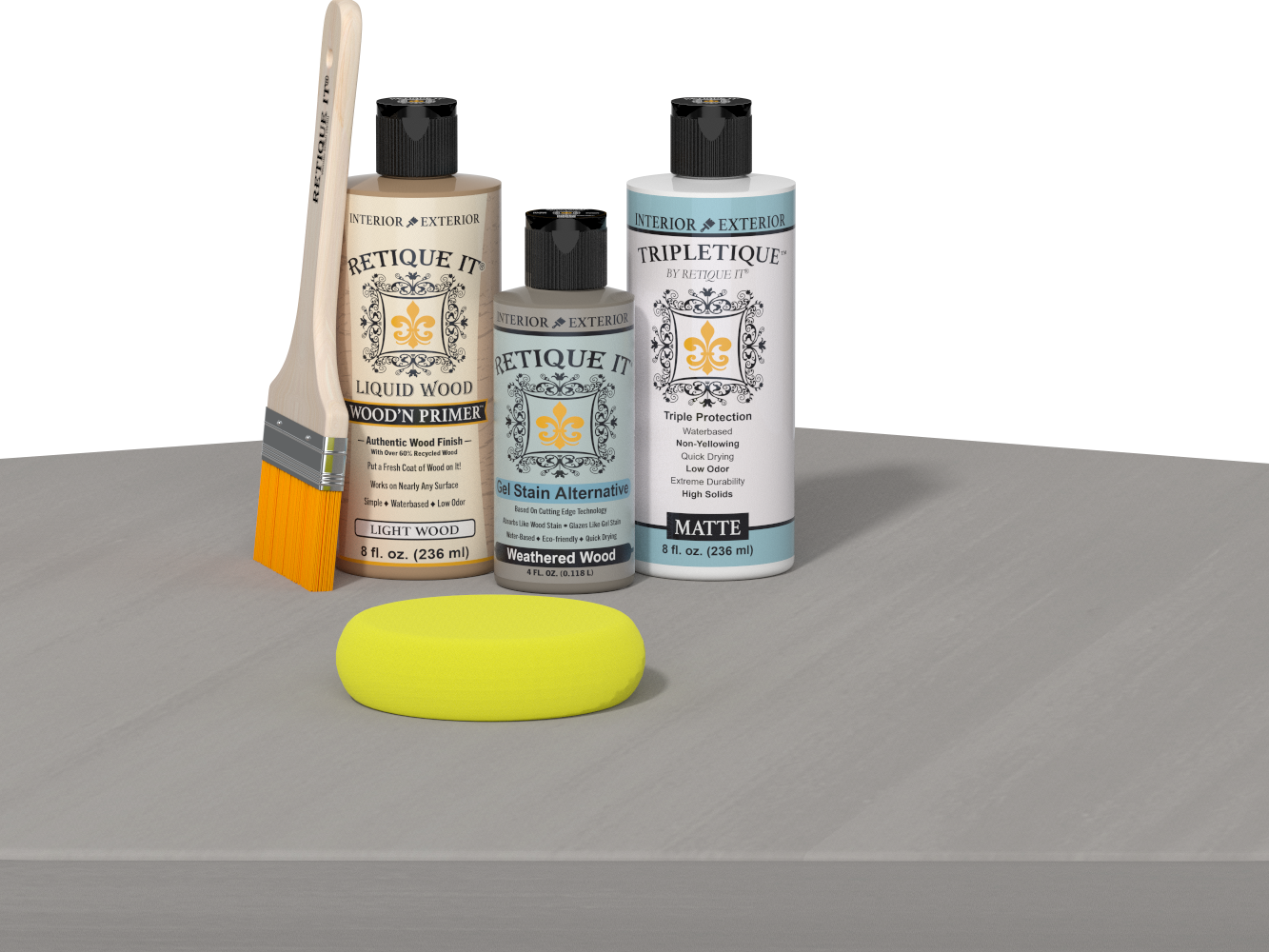 Retique It® Weathered Wood Multipurpose Kit contents with Light Wood Liquid Wood primer, Weathered Wood gel stain alternative, Tripletique matte interior top coat, paintbrush, and yellow sponge displayed on a wood surface.