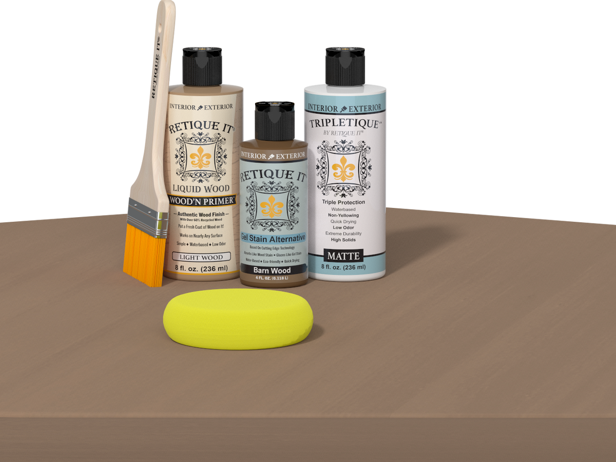 Retique It® Barn Wood Multipurpose Kit contents with Light Wood Liquid Wood primer, Barn Wood gel stain alternative, Tripletique matte interior top coat, paintbrush, and yellow sponge displayed on a wood surface.