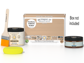 Retique It® White Oak Multipurpose Kit with Liquid Wood primer, gel stain alternative, paintbrush, and yellow sponge displayed in front of the product box.