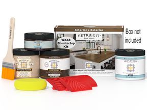 Wood countertop kit with paint cans, a brush, and a box in the background