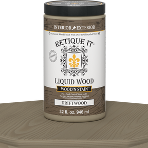 Retique It Liquid Wood Wood'n Stain in Drift Wood color, 32 oz bottle, showcasing the stain's natural wood finish and applicator.
