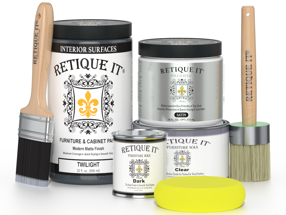 Retique It furniture paint products with brushes and a sponge on a white background