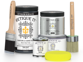 Retique It furniture paint products with brushes and a sponge on a white background