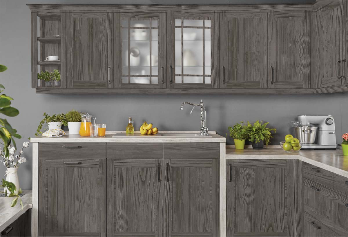 Large Harbor Gray Wood'n Finish Kit for exterior wood surfaces, showing textured wood grain on kitchen cabinets.