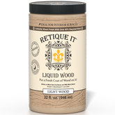 Retique It® Liquid Wood interior paint in 32oz Light finish, showing a smooth application on a wooden surface.