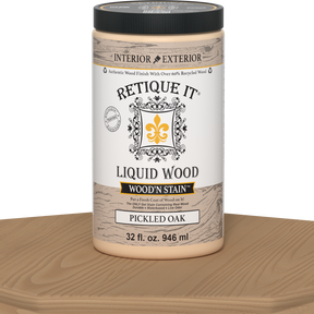 Retique It Liquid Wood Wood'n Stain in Pickled Oak, 32 oz container, showcasing the stain's color and smooth application.