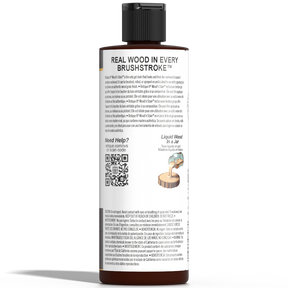 Liquid Wood Wood'n Stain in Red Mahogany color by Retique It, showing the stain bottle with a wood surface sample.