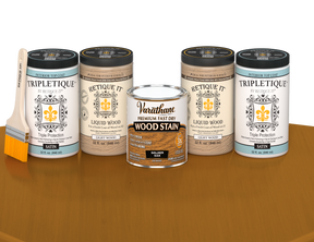 64 oz Retique It Liquid Wood kit with Golden Oak stain, satin Tripletique topcoat, and a paintbrush on a matching finished tabletop.