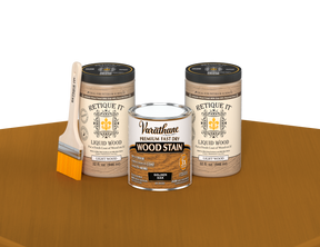 64 oz Retique It Liquid Wood kit with Varathane Golden Oak stain and a paintbrush on a matching finished tabletop.
