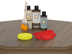 Wood care products including bottles, a brush, and cloths on a wooden surface.