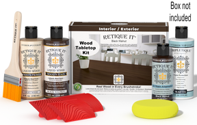 Retique It® Black Walnut Wood Tabletop Kit with Light Wood primer, Black Walnut stain, Black Walnut gel stain alternative, Matte Tripletique® Top Coat, brush, red graining tool, yellow sponge, and product box.