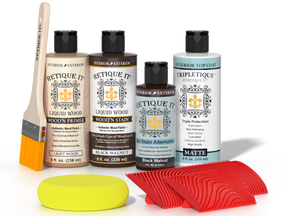Retique It® Black Walnut Wood'n Kit with Light Wood primer, Black Walnut stain, Black Walnut gel stain alternative, Matte Tripletique® Top Coat, brush, red graining tool, and yellow sponge.
