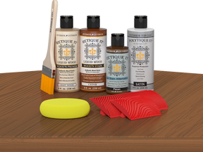 Retique It® Wood'n Finish Kit in cedar, a multi-purpose exterior top coat shown on a table for wood finishing projects.