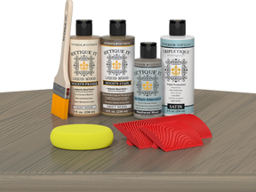 Retique It® Drift Wood Wood'n Kit with Satin TripleTique® includes a brush, Light Wood primer, Drift Wood stain, Weathered Wood Gel Stain Alternative, Satin TripleTique® top coat, a yellow sponge, and a red graining tool.