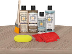 Retique It® French Oak Wood'n Kit with Light Wood primer, Barn Wood stain, White Wash gel stain alternative, Matte Tripletique® Top Coat, brush, red graining tool, and yellow sponge.