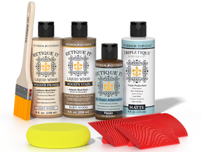 Retique It® Medium Walnut Wood'n Kit with Light Wood primer, Barn Wood stain, Pecan gel stain alternative, Matte Tripletique® Top Coat, brush, red graining tool, and yellow sponge.