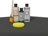 Retique It refinishing kit with Light Wood primer, Charcoal gel stain alternative, matte Polytique It topcoat, a brush and yellow sponge.