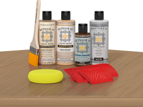 Retique It® Wood'n Kit in Pickled Oak, a multi-purpose exterior top coat set displayed on a table.