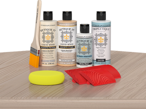 Retique It® Wood'n Finish Kit Sun Bleached tabletop with wood finish sample and tools for wood finishing projects.