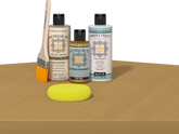 Retique It refinishing kit with Light Wood primer, Old Oak gel stain alternative, matte Tripletique topcoat, a brush and yellow sponge.