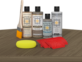 Retique It® Wood'n Finish Kit in Weathered Wood, exterior top coat, showing applicator and weathered wood finish on a wooden surface.