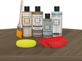 Retique It® Weathered Wood Wood'n Kit with Matte TripleTique® includes a brush, Light Wood primer, Weathered Wood stain, Weathered Wood Gel Stain Alternative, Matte TripleTique® top coat, a yellow sponge, and a red graining tool.