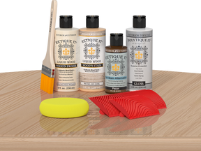White oak Wood'n Finish Kit by Retique It® with exterior top coat, displayed on a table for multi-purpose wood finishing.