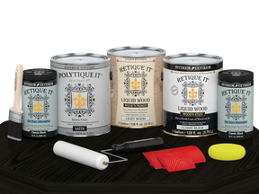 Retique It Decking Wood'n Kit in Classic Black stain, satin finish, displayed on a table with wood decking samples.