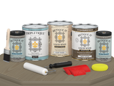 Retique It® Wood'n Kit Drift Wood interior top coat set with four large matte finish bottles on a table.