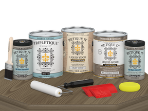 Retique It® Wood'n Finish Kit with four weathered wood interior top coats, matte finish, shown on a wooden table surface.