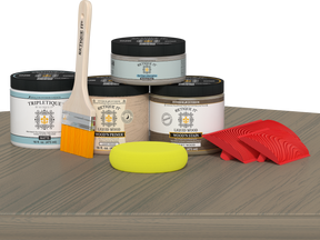 Retique It Wood'n Finish Kit in Drift Wood stain, double size, displayed on a table showing the stain application and wood finish.