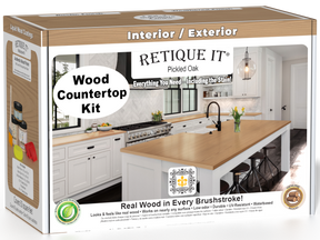 Retique It® Wood'n Finish Kit in Pickled Oak stain for tabletops, featuring stain bottles and application tools in a double-sized box.