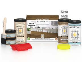Retique It® Wood'n Finish Kit with four large containers of barn wood stain, displayed on a tabletop with applicator brushes.