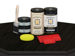 Retique It Wood'n Finish Front Door Kit (Double) in classic black stain, displayed on a table showcasing the door's smooth finish.