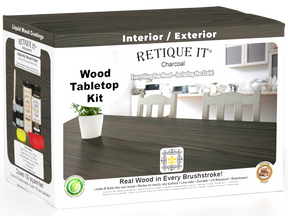 Retique It® Wood'n Finish Kit with four large charcoal stain bottles for wood finishing projects on a tabletop.