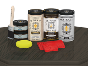 Retique It Wood'n Finish front door kit in Charcoal stain, featuring a double door with a glossy finish on a table.