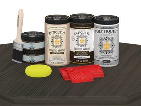 Retique It Wood'n Finish front door kit in charcoal stain, double door with matte finish displayed on a table.