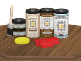 Retique It® Wood'n Finish Kit Large in Dark Oak with interior top coat, showing a matte wood table surface.