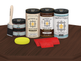 Retique It® Wood'n Finish Kit Java stain with four large bottles, matte finish, shown on a tabletop for wood finishing projects