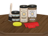 Retique It® Modern Walnut Wood Kit with primer, stains, brush, yellow sponge, and red graining tools.