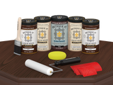 Retique It® Wood'n Cabinet Kit Java stain with 24 grained cabinet doors displayed on a table for a natural wood look.