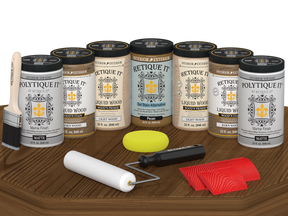 Retique It® Barn Wood Kit with primer, stains, matte topcoat, brush, roller, yellow sponge, and red graining tools.