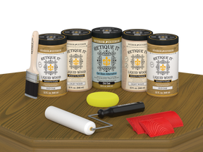 Retique It® Wood'n Cabinet Kit in Old Oak stain with 24 grained cabinet doors on table display.