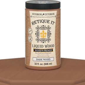 Retique It® Liquid Wood Wood'n Primer in Dark Wood, 32 Fl oz, applied to a surface showing deep wood grain primer.
