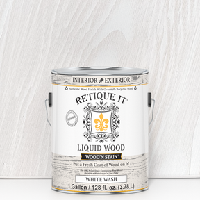 Retique It Liquid Wood Wood'n Stain in white wash, 128 oz, showing the creamy white stain applied to wood surface.