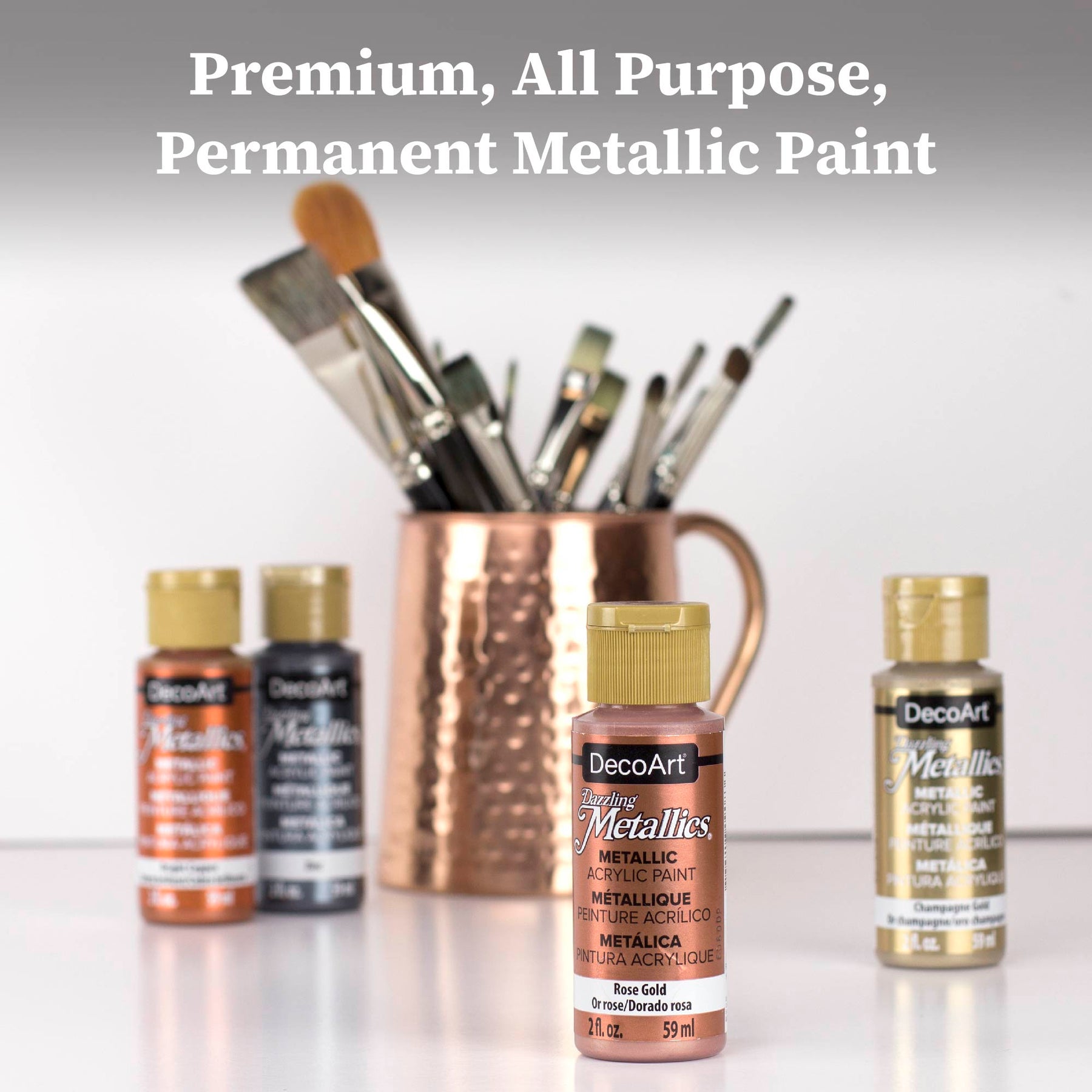 DecoArt Dazzling Metallics acrylic paint set with 9 bold metallic colors in 2 fl oz bottles for art and craft projects.