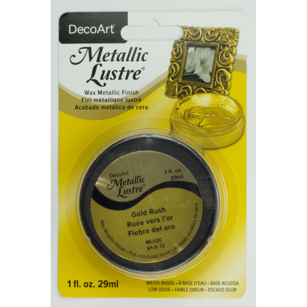 DecoArt Metallic Lustre Champagne Ice in 1 oz bottle, shiny metallic finish on smooth surface, ideal for craft and art projects.