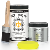 Retique It Ivory Tower furniture and cabinet paint in a quart container, showcasing a smooth, light ivory finish for furniture.