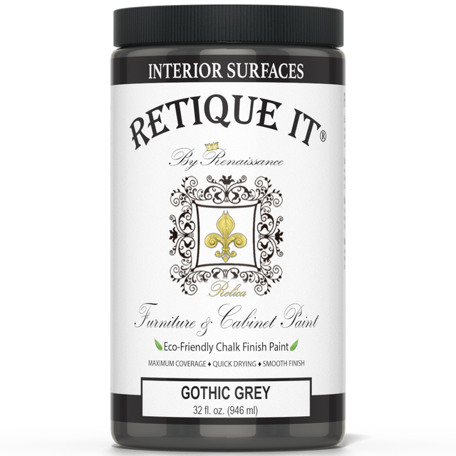 Retique It Gothic Grey furniture and cabinet paint can with paintbrush showing the textured grey paint on a wooden surface.