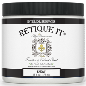 Retique It® furniture and cabinet paint in quart size, Snow color, with a smooth, freshly painted cabinet surface.
